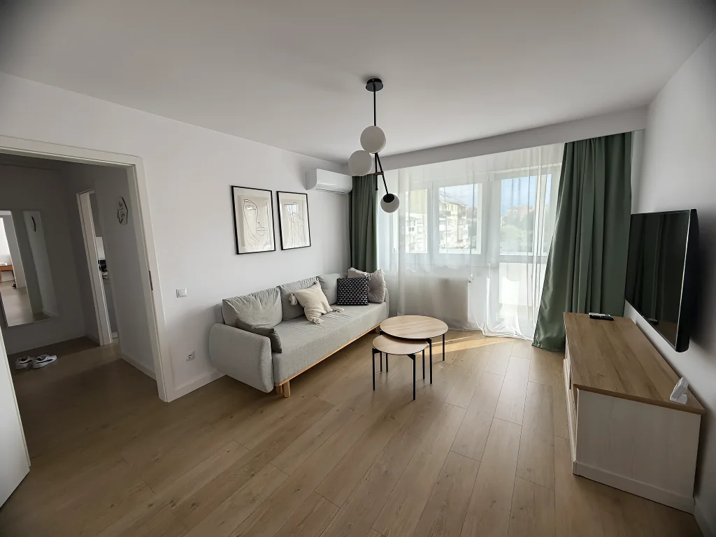 living cu canapea si televizor apartament inchiriere Sibiu Sibiu