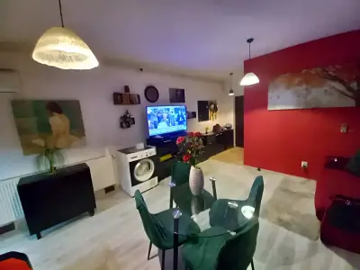 Vanzare garsoniera Bragadiru Ilfov sufragerie cu televizor