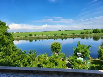 Vedere superba spre lac de pe terasa casei Balotesti Ilfov