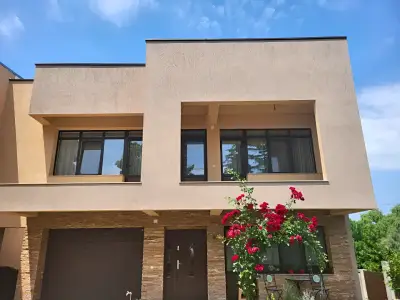 Fatada casa de vanzare cu garaj spatios in Balotesti Ilfov