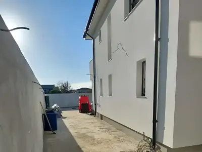 Casa de vanzare in Bragadiru Ilfov sub cer senin albastru