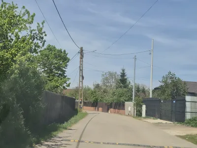 Teren vanzare cumparare Balotesti Ilfov strada cu gard nou