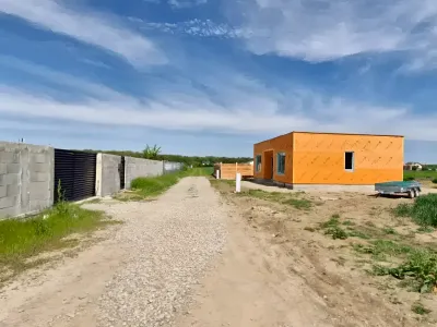 Teren vanzare cumparare Balotești Ilfov drum neasfaltat