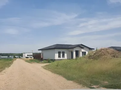 casa pe drum neasfaltat teren vanzare cumparare Balotești Ilfov