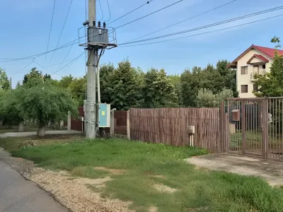teren vanzare cumparare Balotești Ilfov vedere spre case