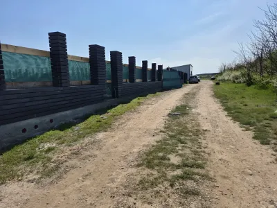 Vanzare teren cu drum de pamant in Balotesti Ilfov