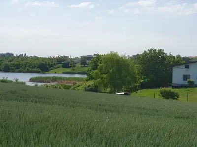 Teren intravilan de vanzare Balotești Ilfov pe malul apei