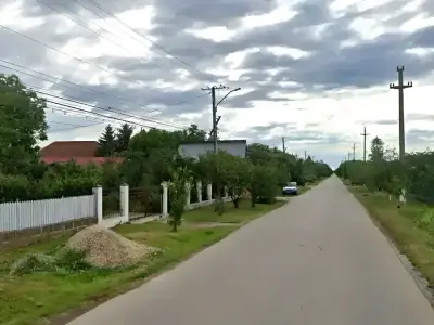Teren de vanzare Butimanu Dambovita drum acces gard alb