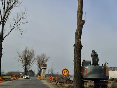 Buldozer pe drum langa teren vanzare cumparare Corbeanca Ilfov